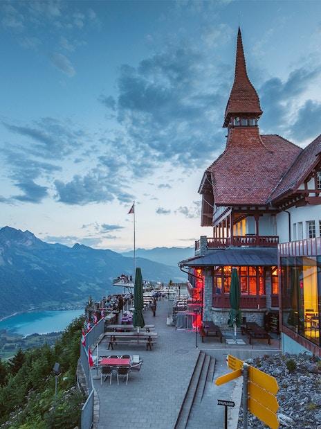 Scenic view from Harder Kulm restaurant overlooking mountains and Lake Brienz, Jungfrau region.