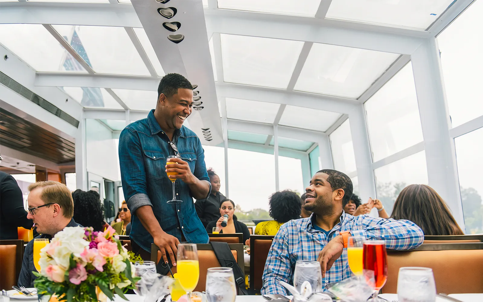 Guests enjoying mimosas on a brunch cruise in Washington DC.