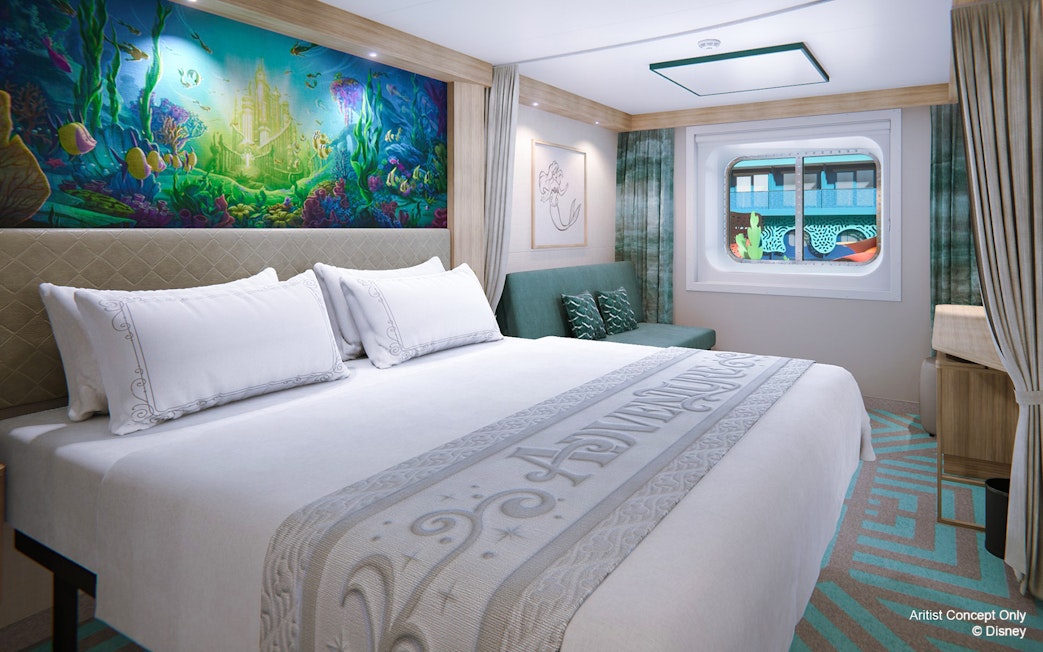 Deluxe Inside Stateroom with reef-themed decor on Disney Adventure Cruise.