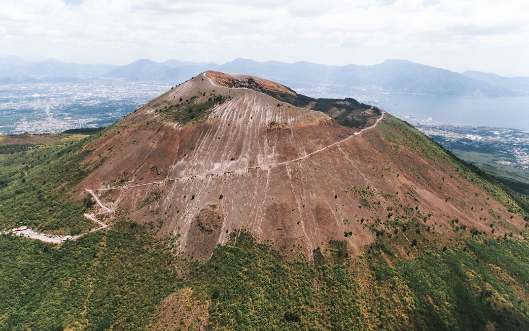 Aerial view of Mount Vesuvius with surrounding landscape in Italy.