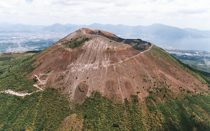 Aerial view of Mount Vesuvius with surrounding landscape in Italy.