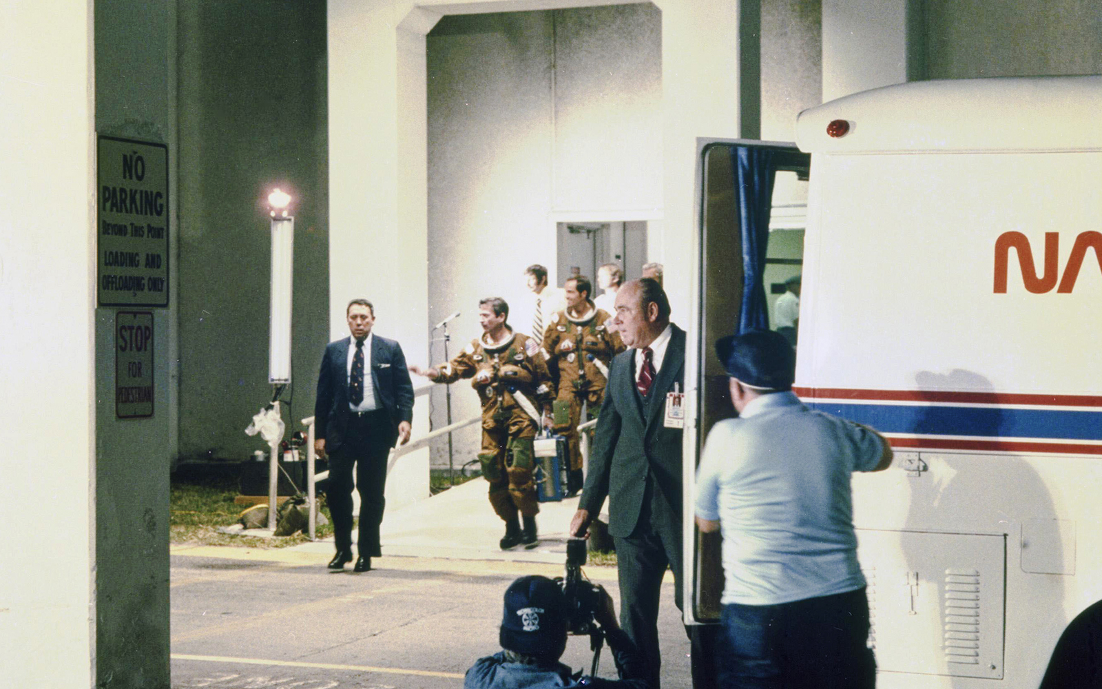 Columbia STS-1 crew walking to Astrovan at Kennedy Space Center.