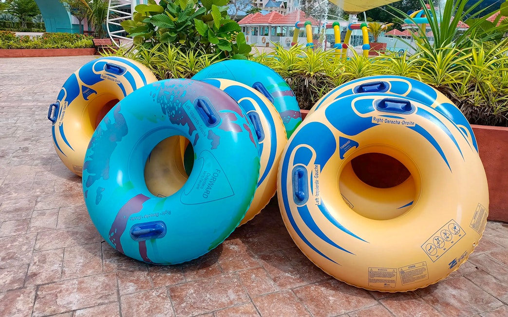 Colorful inflatable tubes at Splash Out Langkawi Water Theme Park.