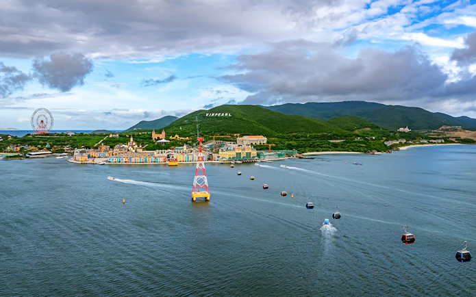 Cable cars over water at VinPearl Harbour, Nha Trang, Vietnam with scenic view.