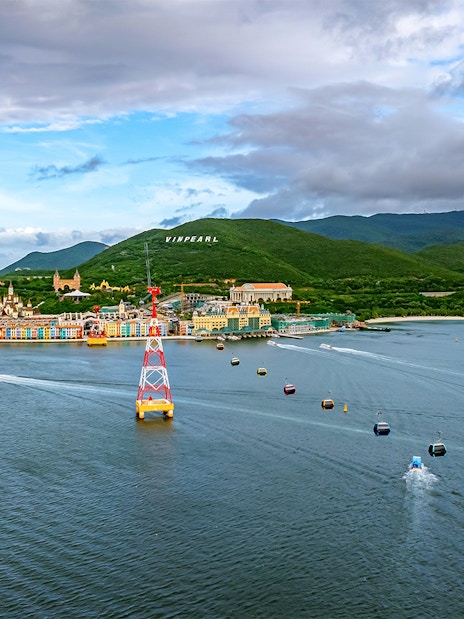 Cable cars over water at VinPearl Harbour, Nha Trang, Vietnam with scenic view.