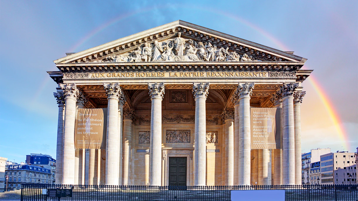 Pantheon in Paris with rainbow in the background.