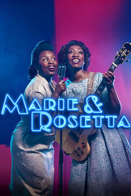 Marie & Rosetta performers singing with a guitar on stage.