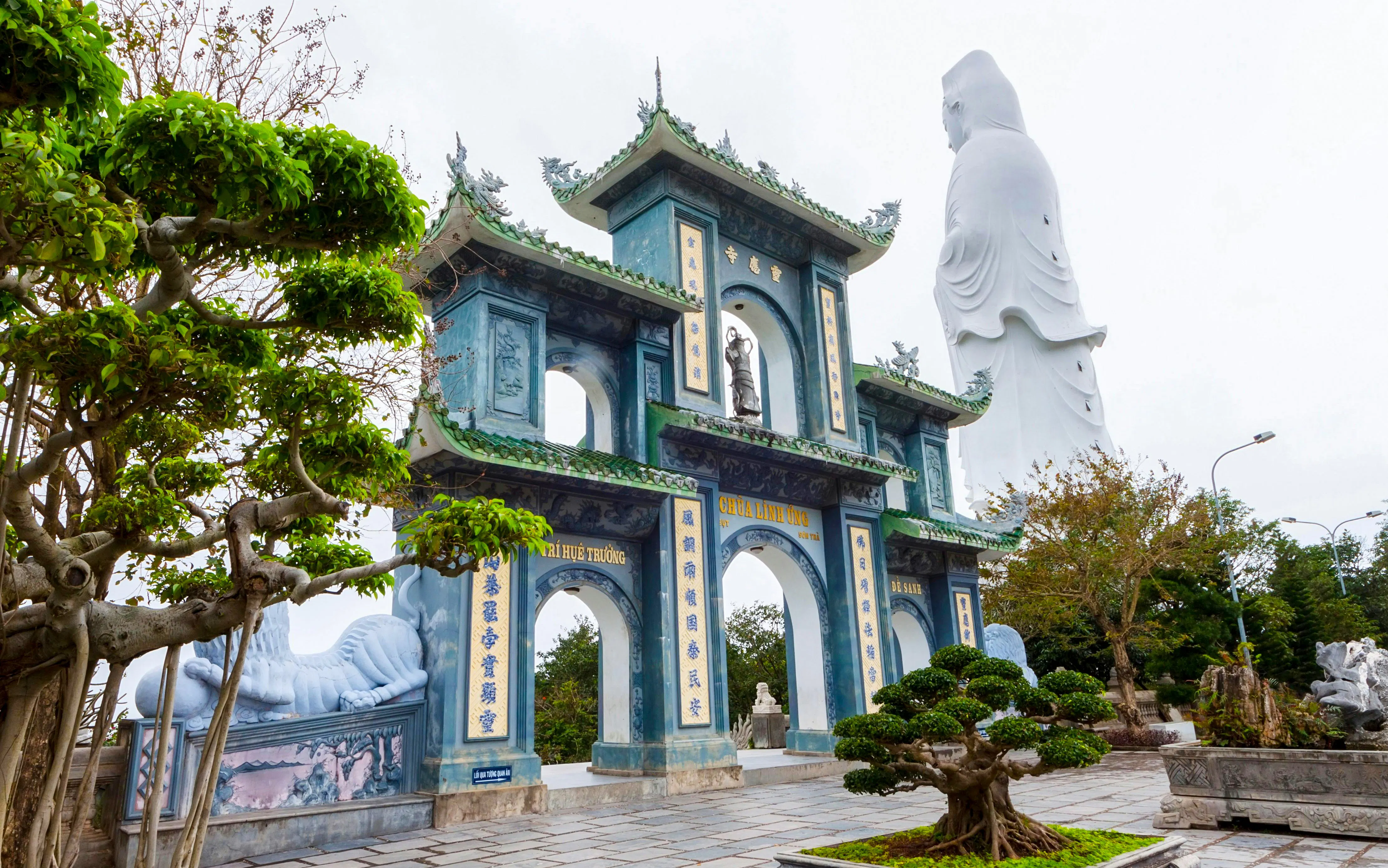 Linh Ung Pagoda entrance with Lady Buddha statue on Son Tra Peninsula, Da Nang, Vietnam.
