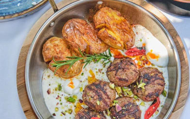 Tirana Street Food and Landmarks Guided Walking Tour – 6 Dishes, 1 Sweet, Dhalle, and Water