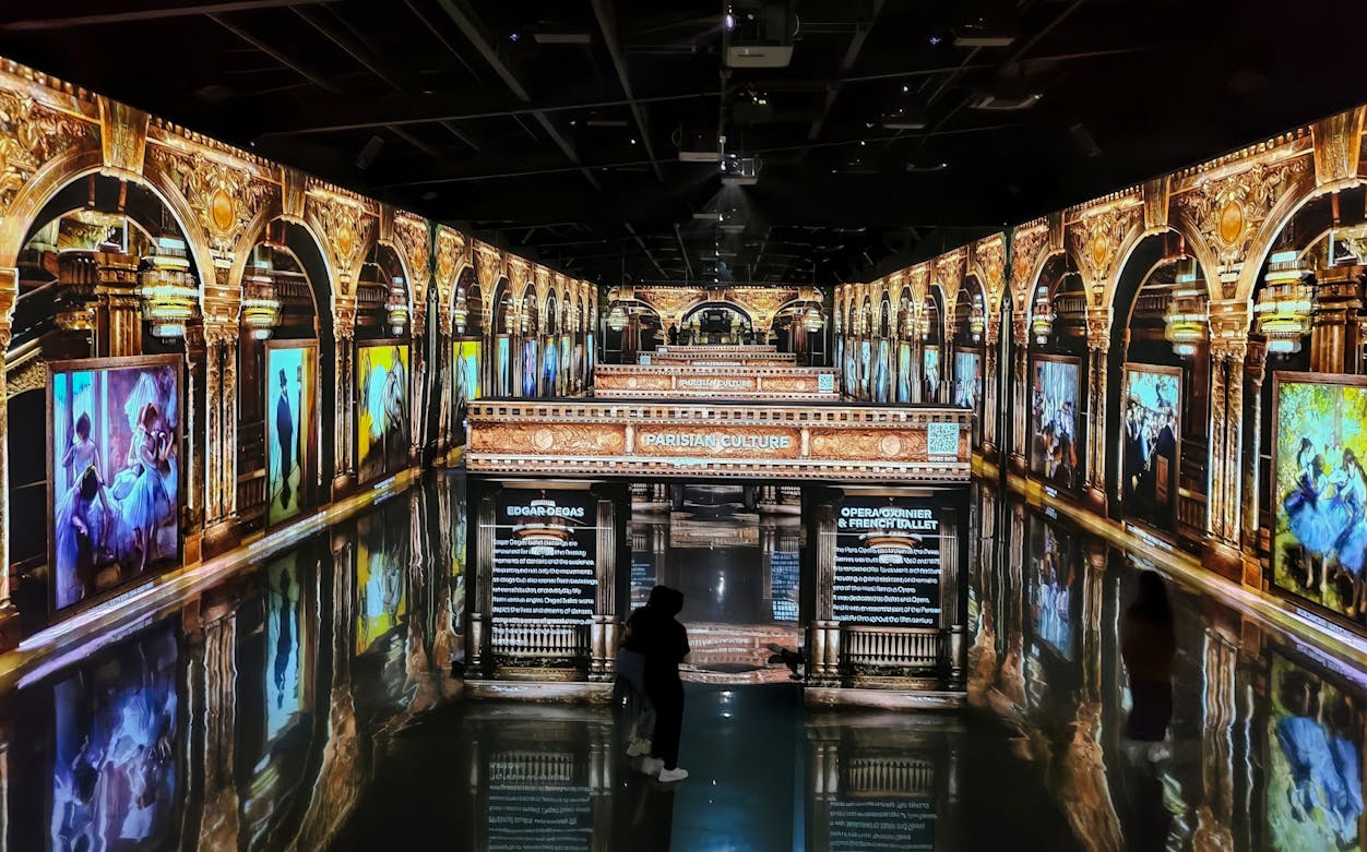 Immersive digital art display at Arte Museum Busan featuring Parisian culture theme.