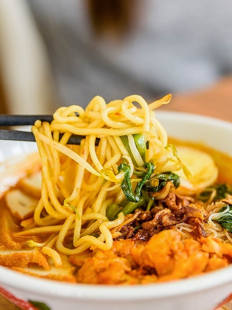 Laksa noodles with vegetables and seafood at Good Old Days international buffet.