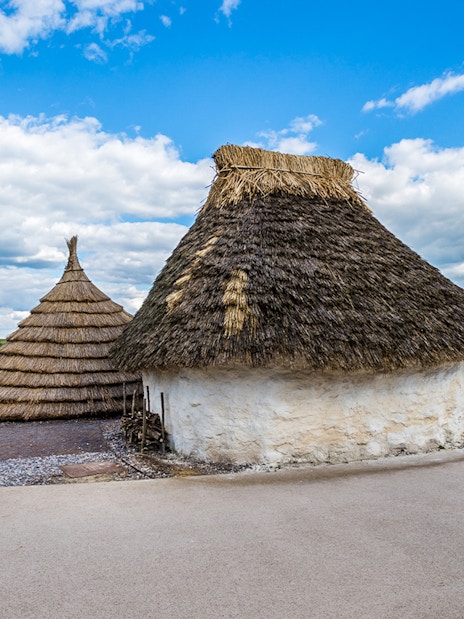 Reconstructed Neolithic huts near Stonehenge, England.