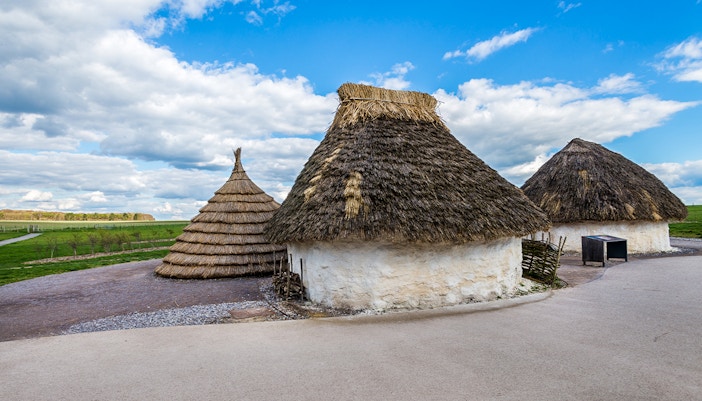 Reconstructed Neolithic huts near Stonehenge, England.