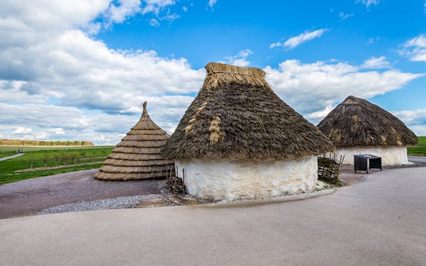 Reconstructed Neolithic huts near Stonehenge, England.