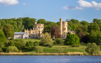 Babelsberg Castle surrounded by lush greenery, Potsdam.