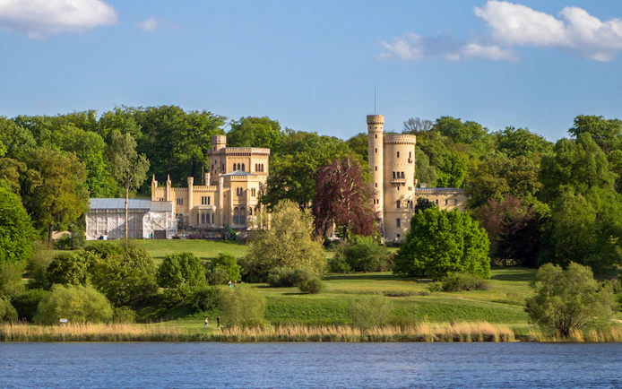 Babelsberg Castle surrounded by lush greenery, Potsdam.