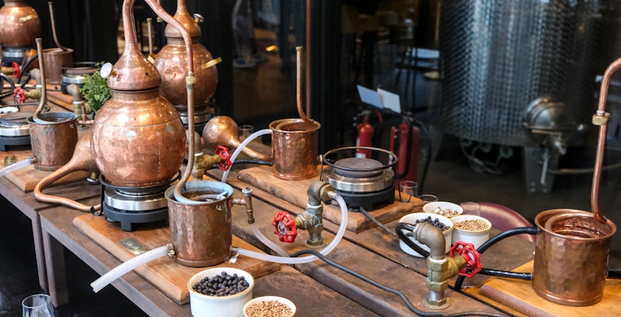 Antique copper distillation tools at The Scotch Whisky Experience.
