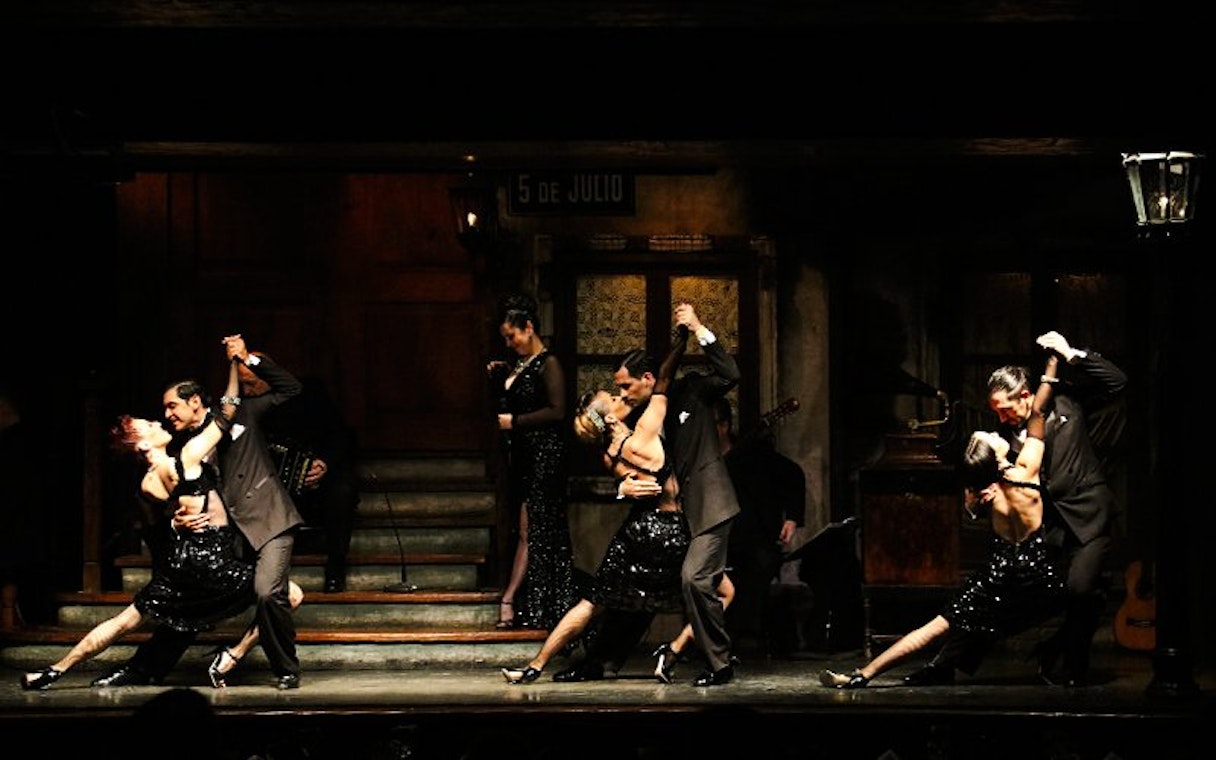 Tango dancers performing at Aljibe Tango Show in Buenos Aires.