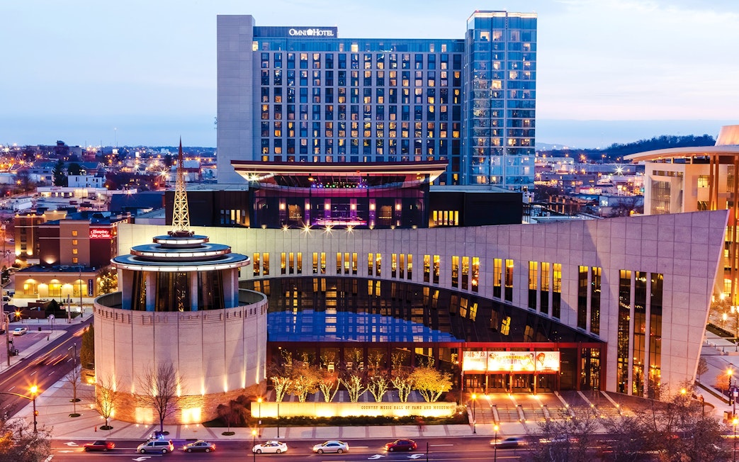 Country Music Hall of Fame building in Nashville at dusk.