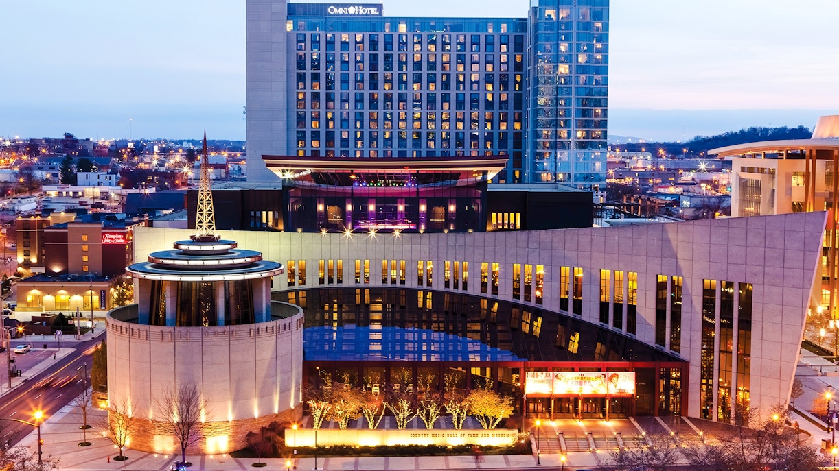Country Music Hall of Fame building in Nashville at dusk.