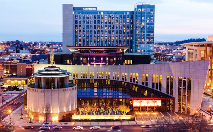 Country Music Hall of Fame building in Nashville at dusk.