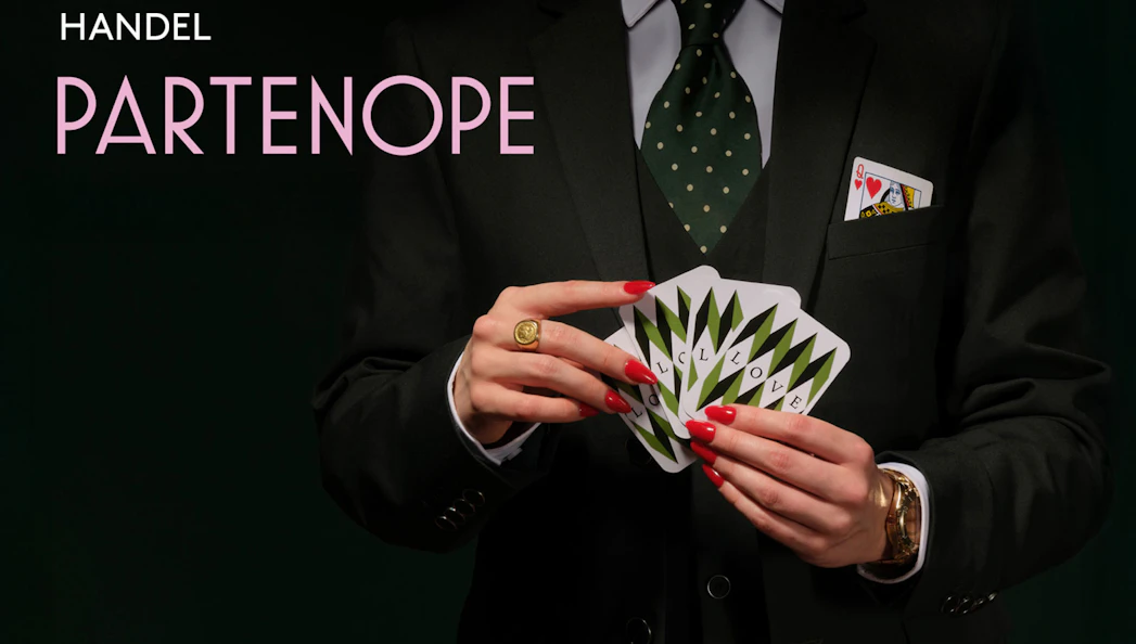 Person in suit holding playing cards with "Partenope" text.