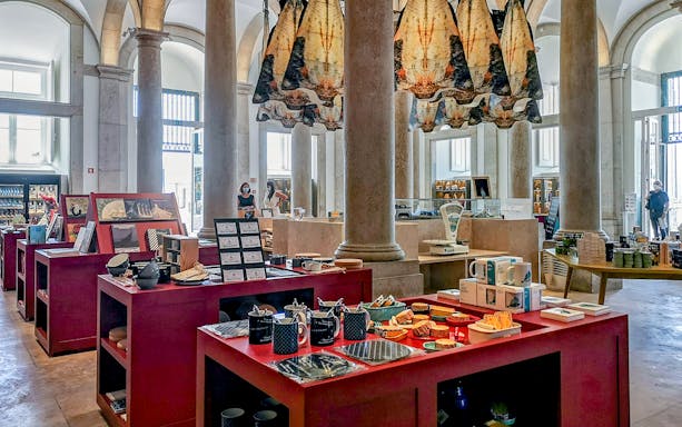 Interior of Codfish History Interpretation Centre with displays of codfish products and historical exhibits.