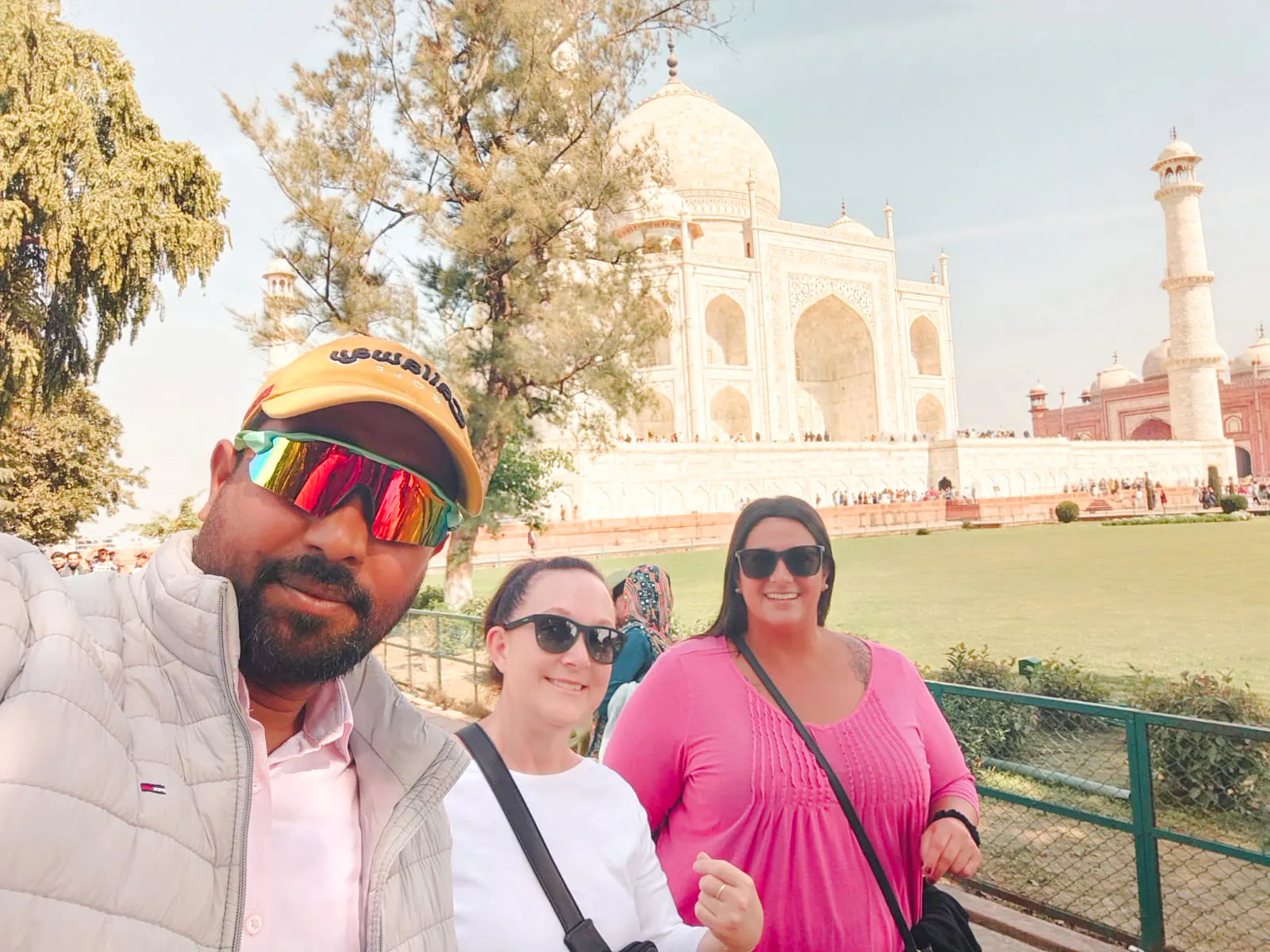 Visitors in front of the Taj Mahal during a guided tour in Agra.