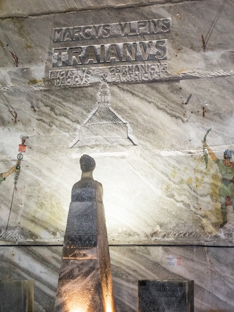 Slanic Prahova Salt Mine interior with Roman carvings and statue, near Bucharest.