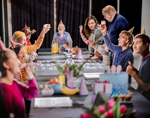 Visitors engaging with interactive exhibit at NEMO Science Museum.