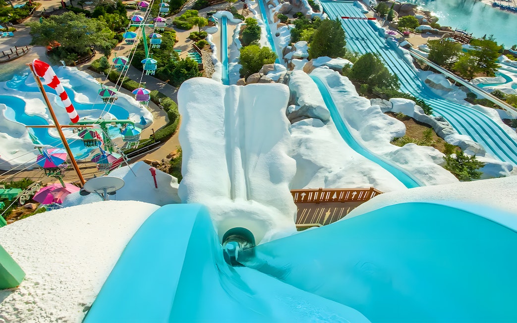 Water slides and snowy landscape at ski resort-themed water park, Walt Disney World Resort, Orlando.