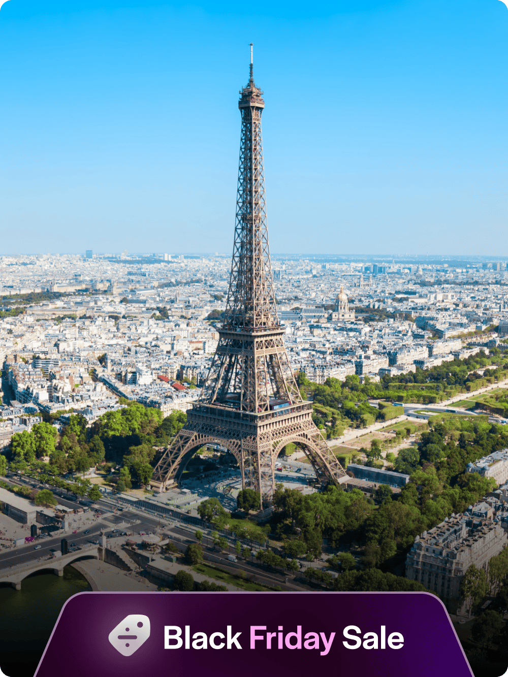 Eiffel Tower aerial view with Paris cityscape in the background.
