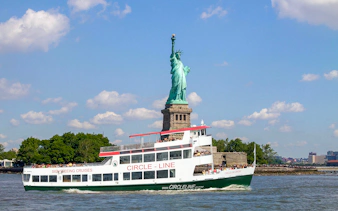 Circle Line cruise passing the Statue of Liberty in New York City.