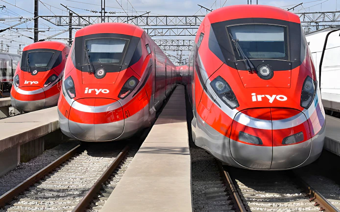 High-speed trains at a station for one-way travel between Barcelona Sants and Madrid Atocha.