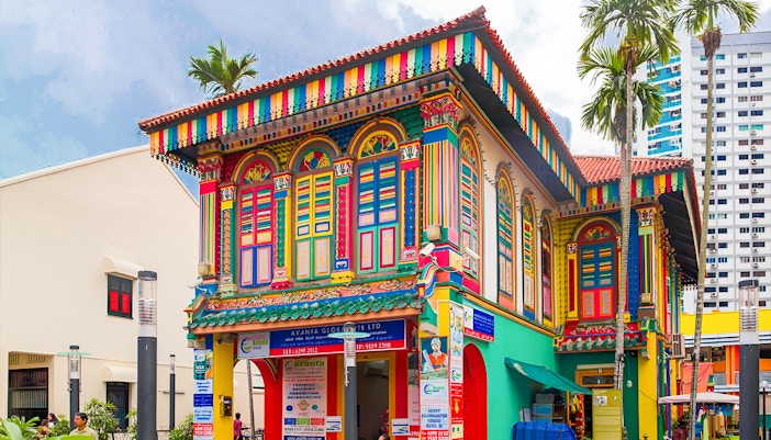 Chinatown street with colorful shophouses, Little India temple, Kampong Gelam mosque in Singapore.