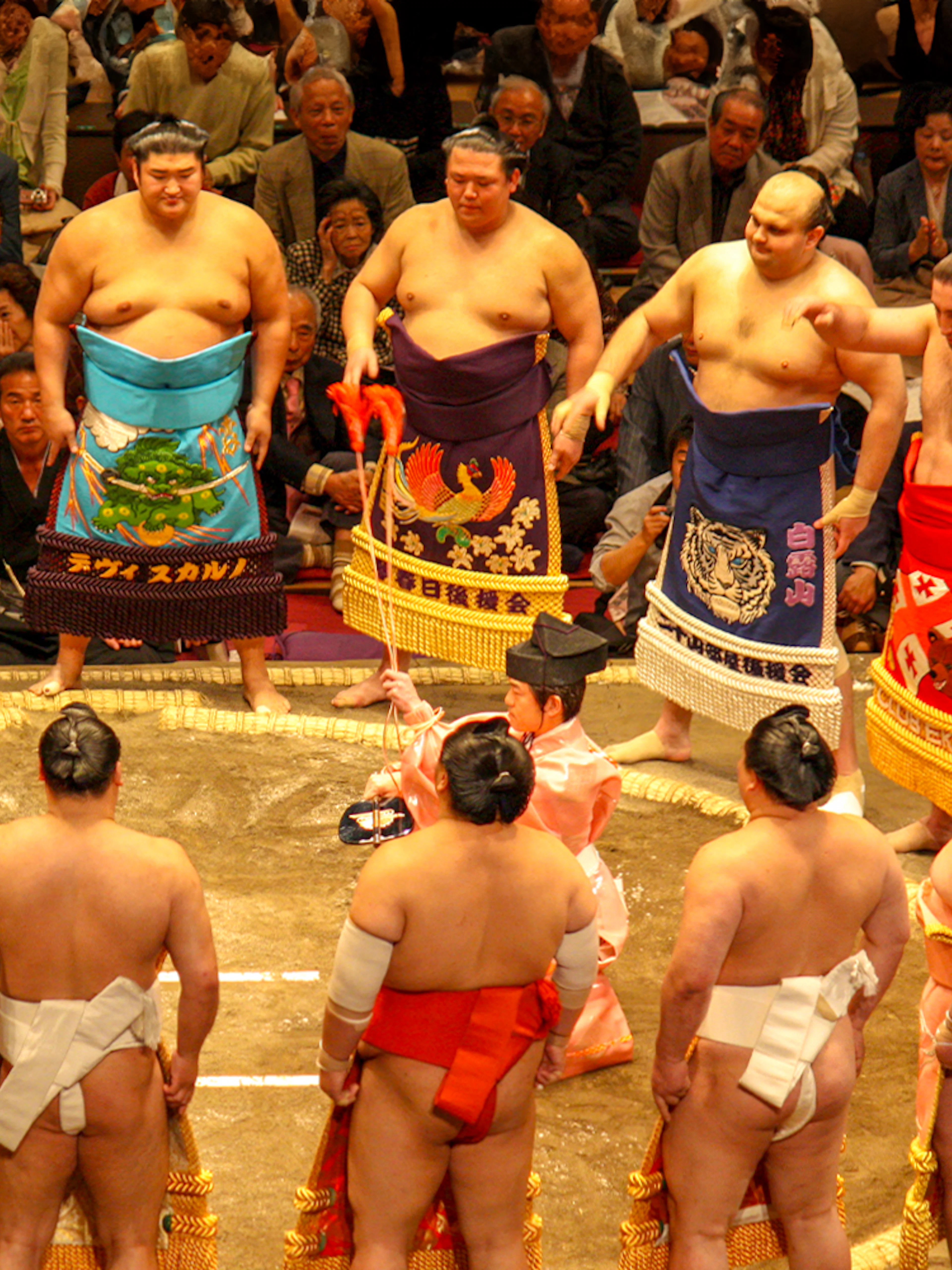 Sumo wrestlers in a ring ceremony at a Fukuoka tournament.