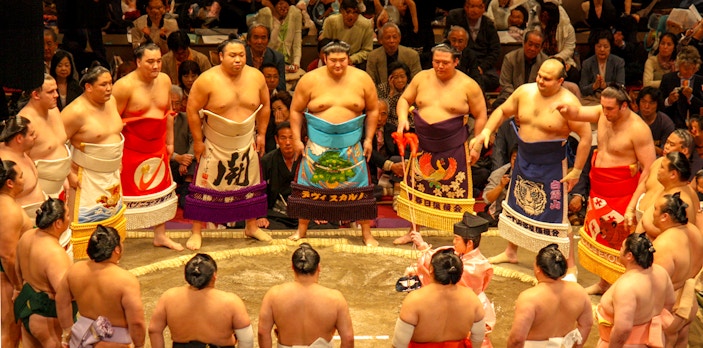 Sumo wrestlers in a ring ceremony at a Fukuoka tournament.