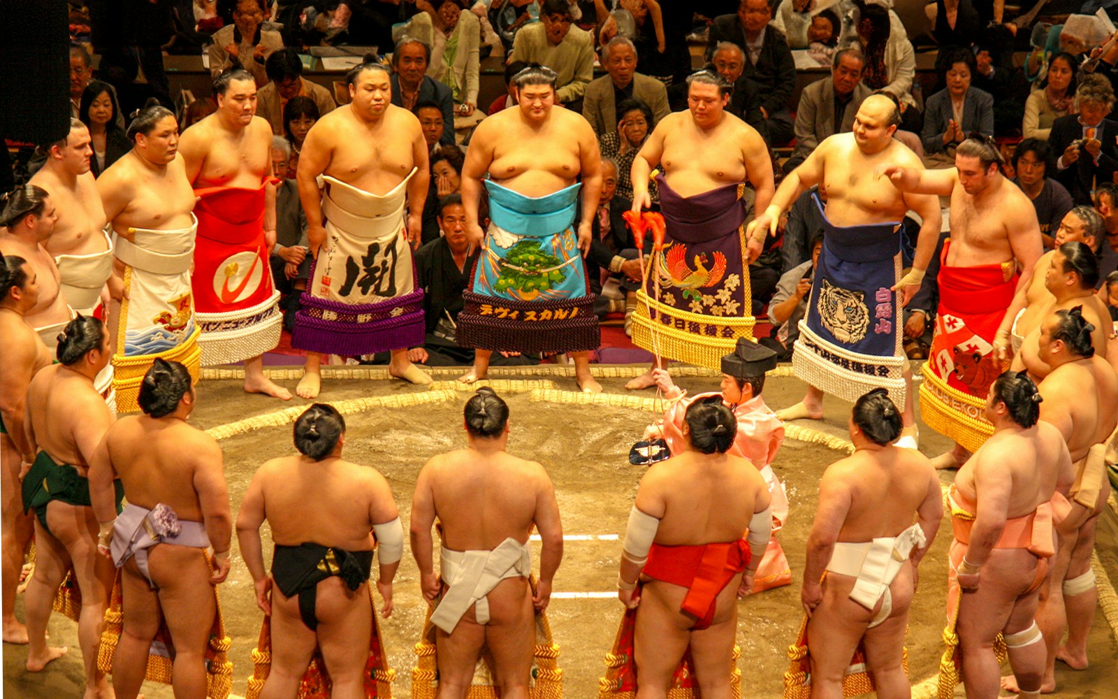 Sumo wrestlers in a ring ceremony at a Fukuoka tournament.