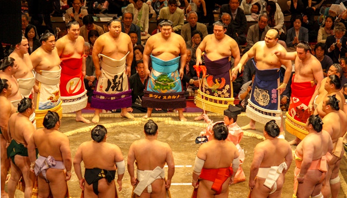 Sumo wrestlers in a ring ceremony at a Fukuoka tournament.