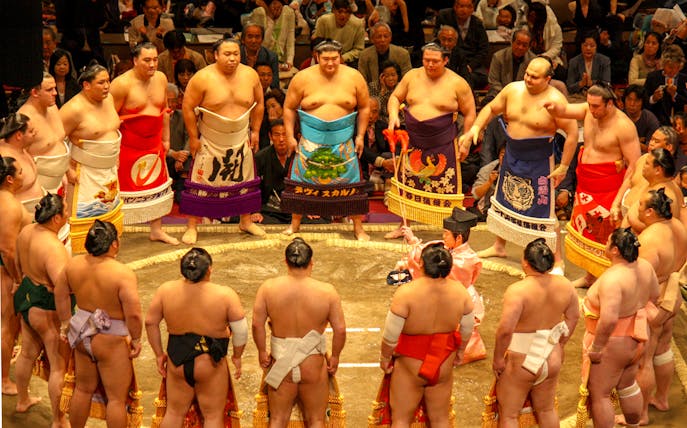 Sumo wrestlers in a ring ceremony at a Fukuoka tournament.