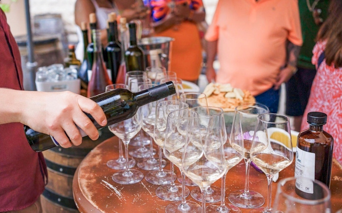 Wine tasting setup in Troodos Mountains village tour from Paphos.