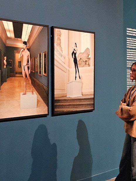 Tourist viewing art exhibit at the Russian Museum.