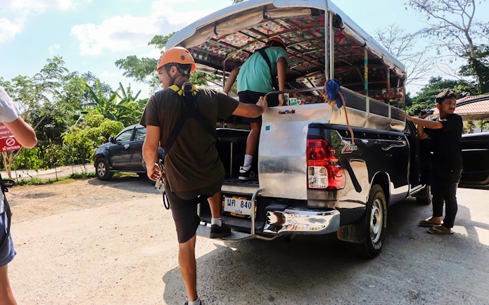 Participants boarding a truck for a zipline adventure in Phuket.