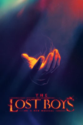 Hand reaching out with glowing light, promoting The Lost Boys Broadway musical.
