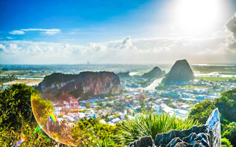 Scenic view from Thủy Sơn peak, overlooking Da Nang city and surrounding Marble Mountains.