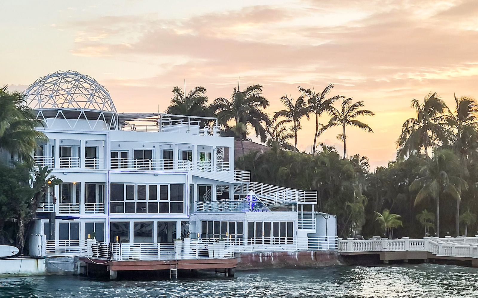 Luxury waterfront mansion with modern architecture on Miami Skyline Cruise.