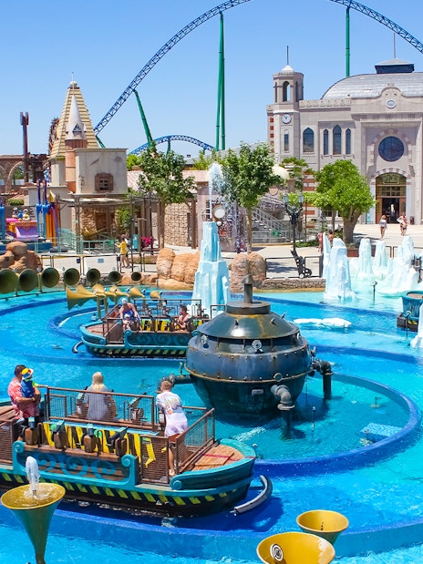 Boats navigating water ride at Land of Legends Theme Park, Antalya.