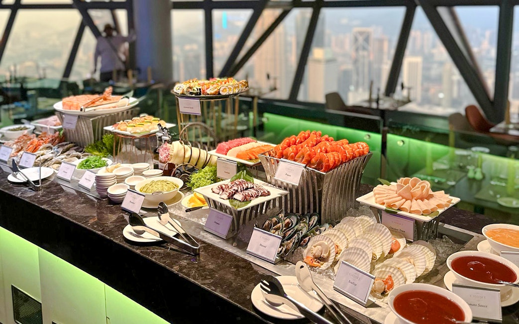 Lunch buffet with seafood and sushi at ORBIT Revolving Dining, KL Tower, Kuala Lumpur.