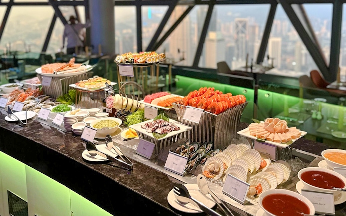 Lunch buffet with seafood and sushi at ORBIT Revolving Dining, KL Tower, Kuala Lumpur.
