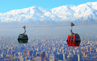 Santiago Cable Car with cityscape and Andes mountains in Chile.